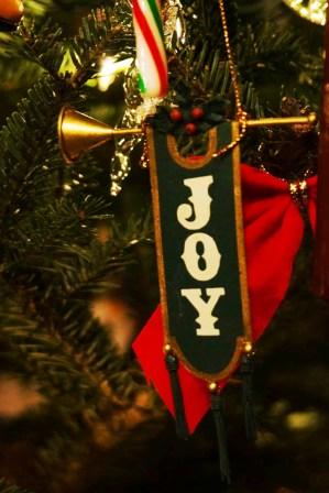 Christmas decoration with joy written on it.