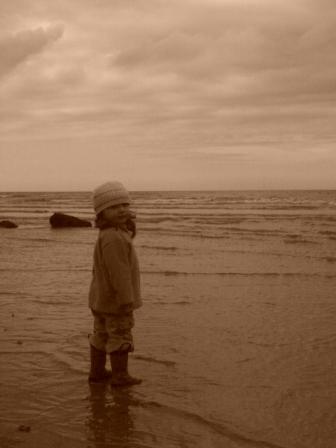 image of a child at the beach