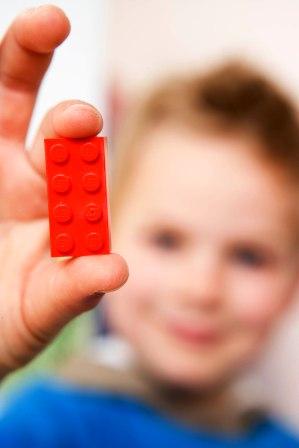2x4brick_red_Held_by_Child